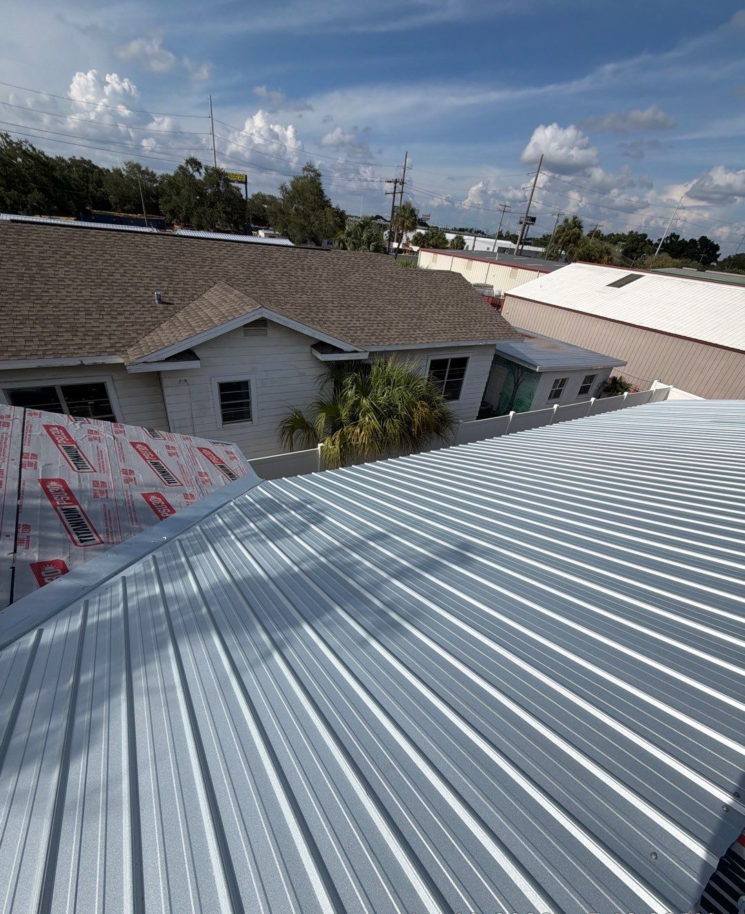 New ribbed metal roof after replacement by Protek Roofing in Tampa FL