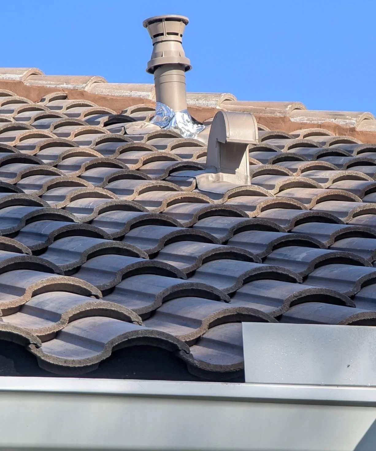 Tile roof vent boot detail work by Protek Roofing in Tampa Bay FL