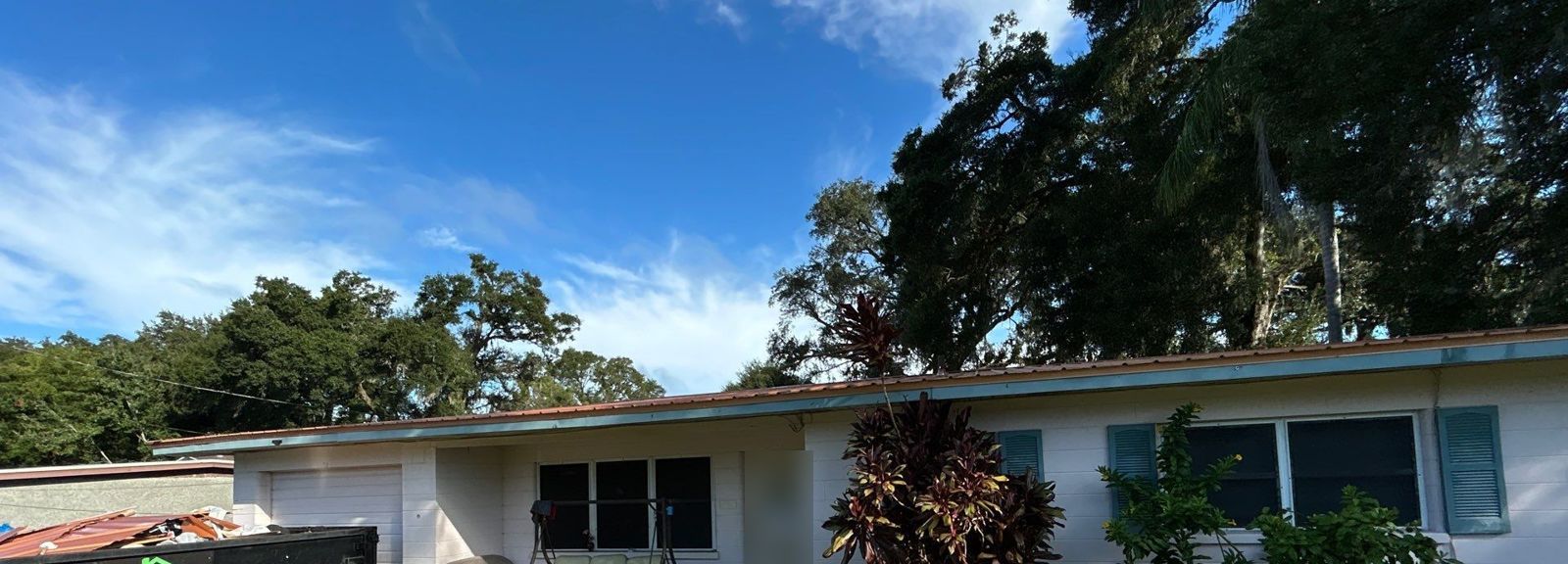 Front of a Brandon home with a new copper metal roof