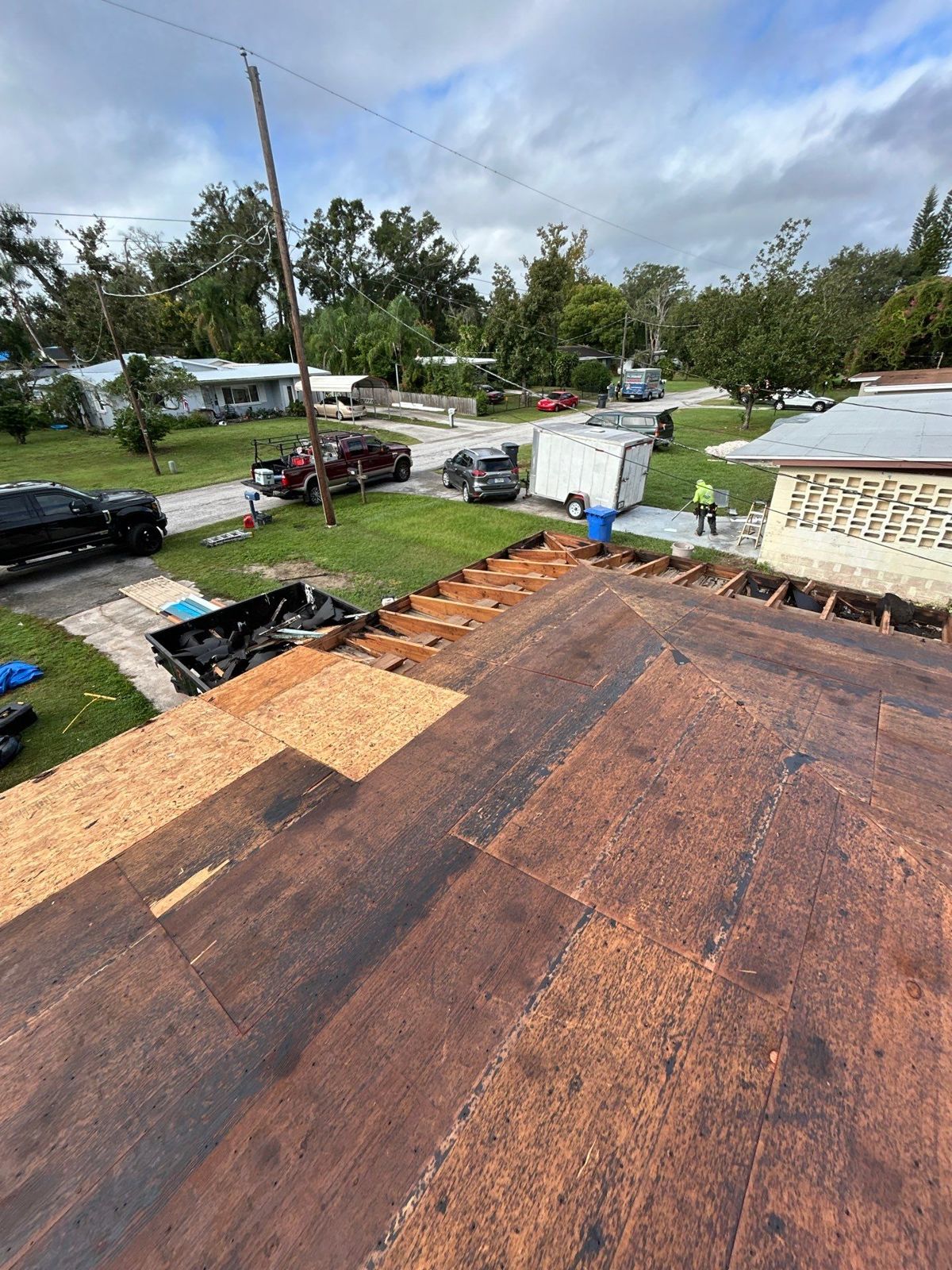Roof decking and rafters exposed during tear-off in Brandon FL
