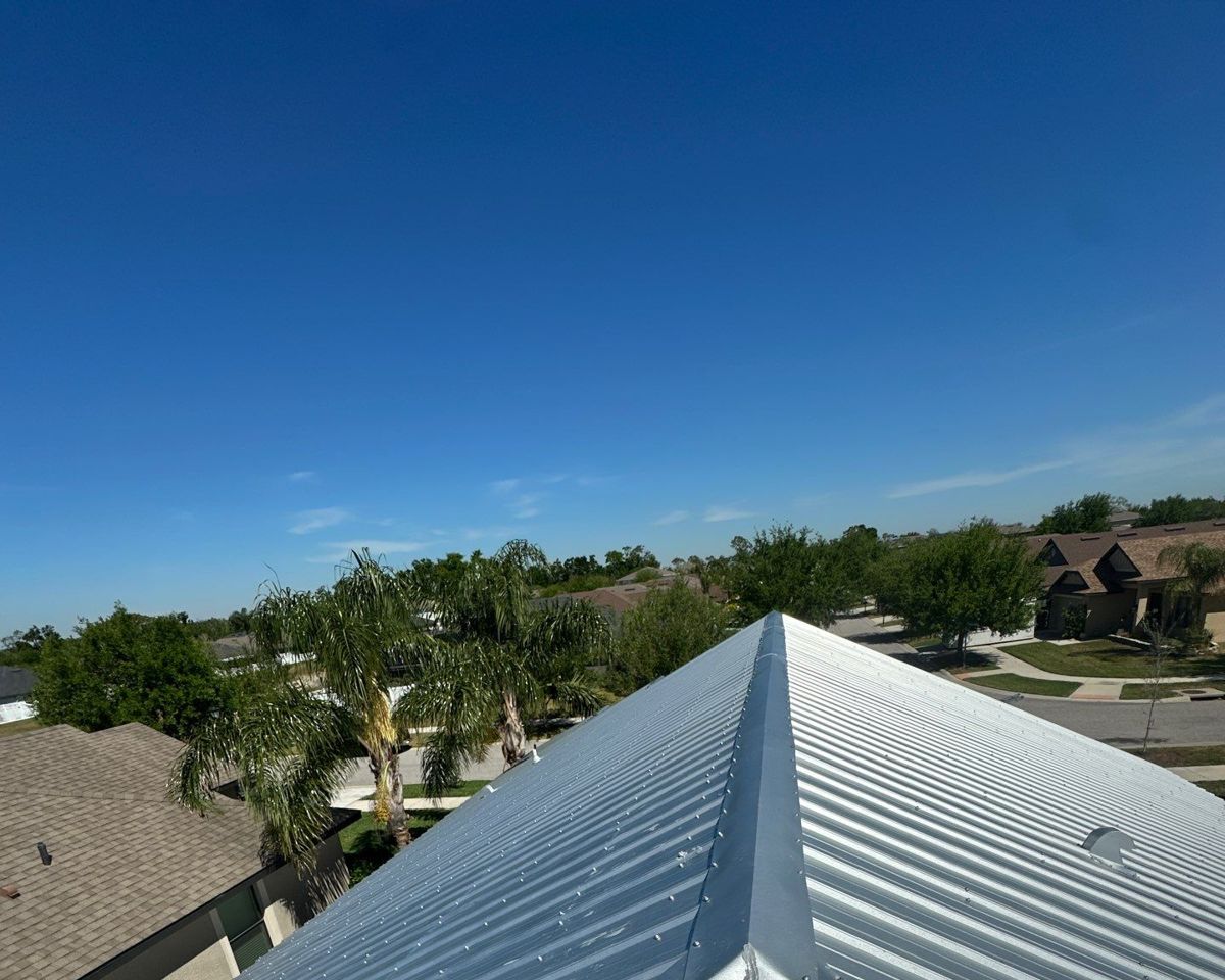 Metal roof ridge cap on a new Galvalume roof in Riverview