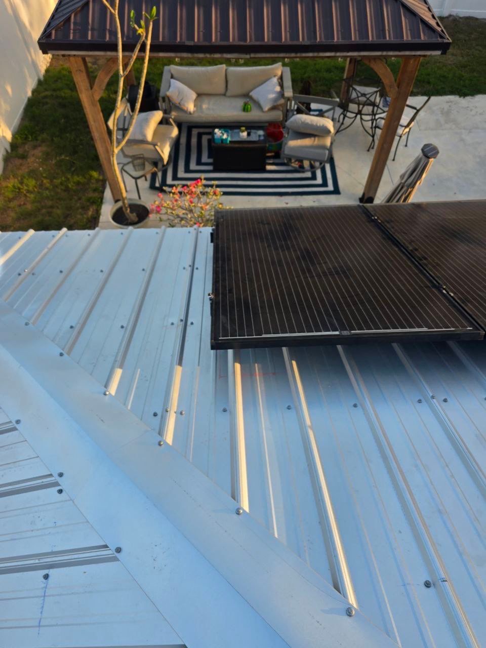 Solar panels reinstalled on a new metal roof in Riverview FL