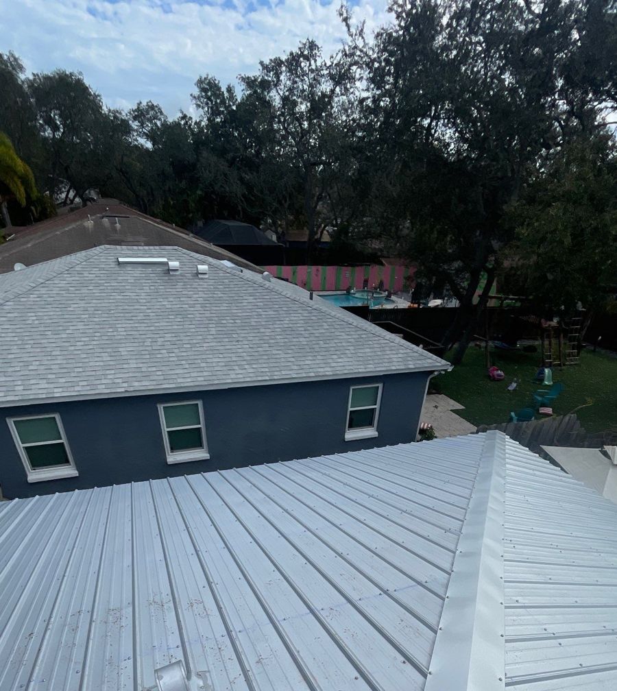 Finished metal roof ridge cap on a South Tampa home