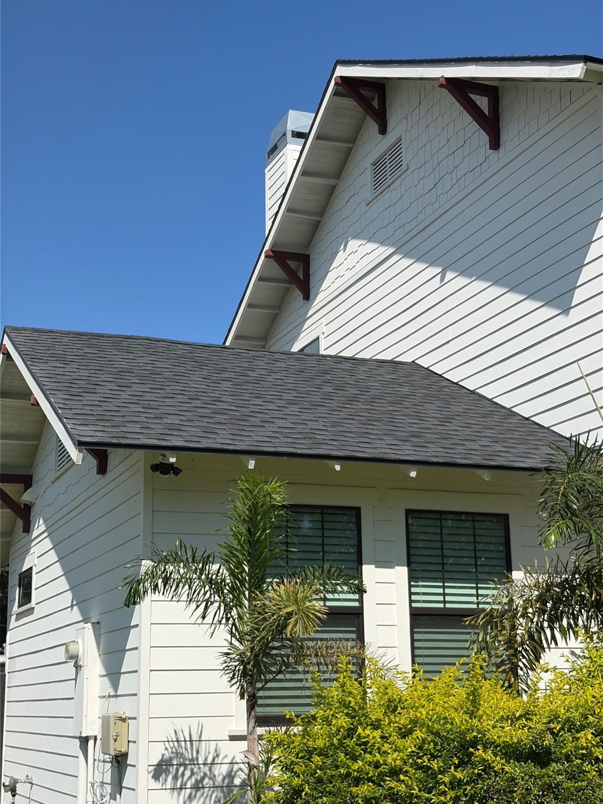 Shingle rooflines and gables of a Tampa FL home after roof repair