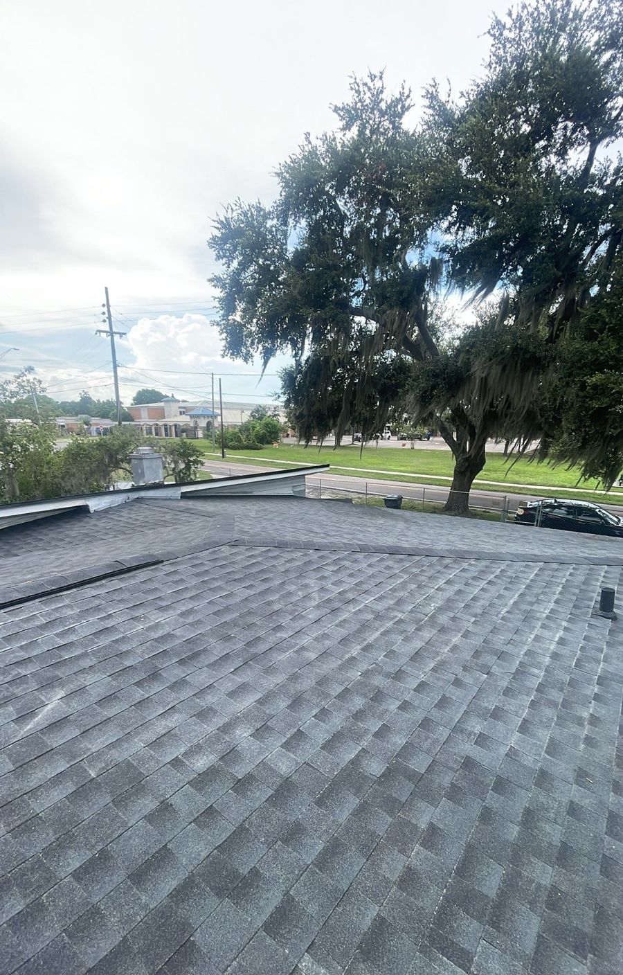 Finished charcoal architectural shingle roof in Lakeland FL