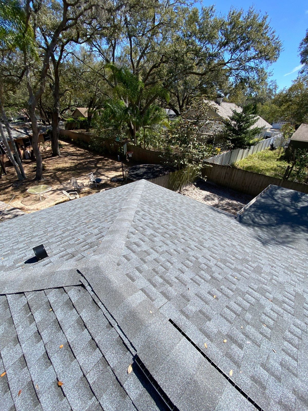 New shingles on a hip roof section in Palm Harbor FL