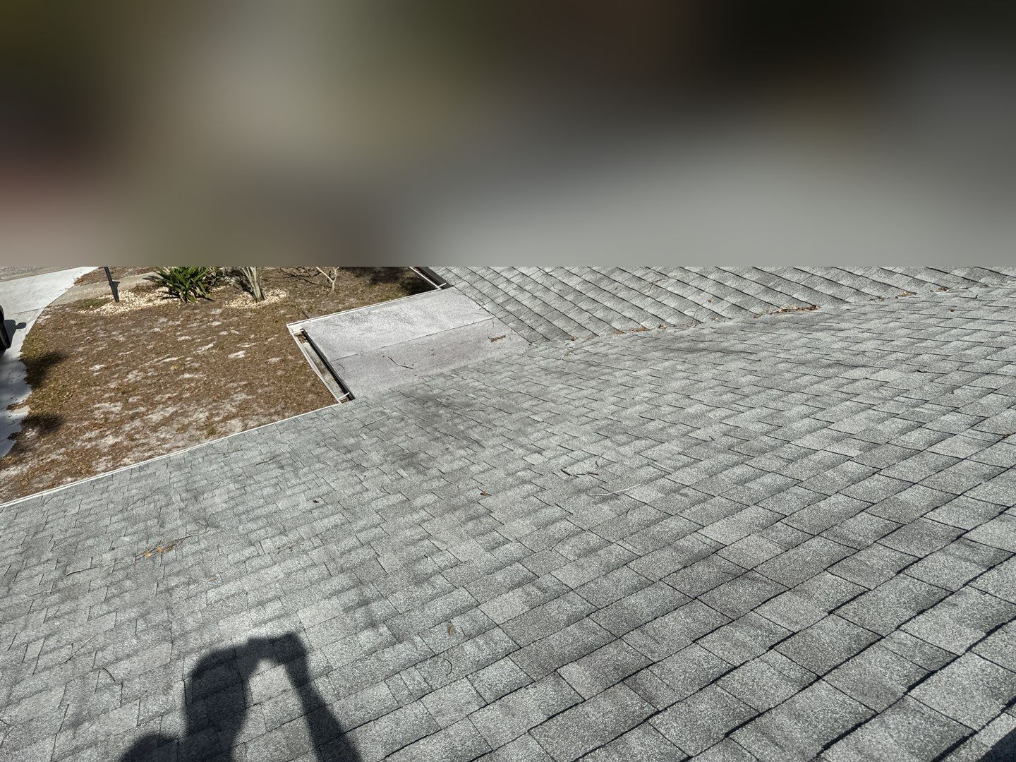 Old front slope shingles before the roof replacement