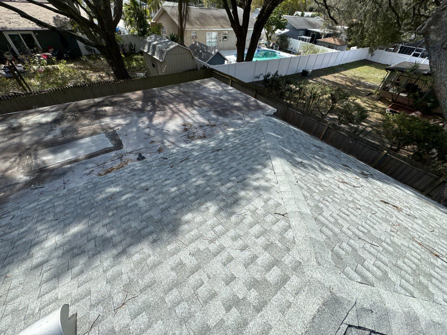 Worn shingle roof on a Palm Harbor home before replacement